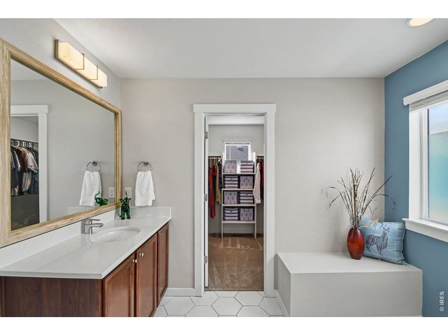 Property Photo 10 Primary bathroom with built-out walk-in closet