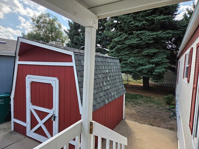 Property Photo 1 Shed with New Roof!  Roof was replaced on home as well.