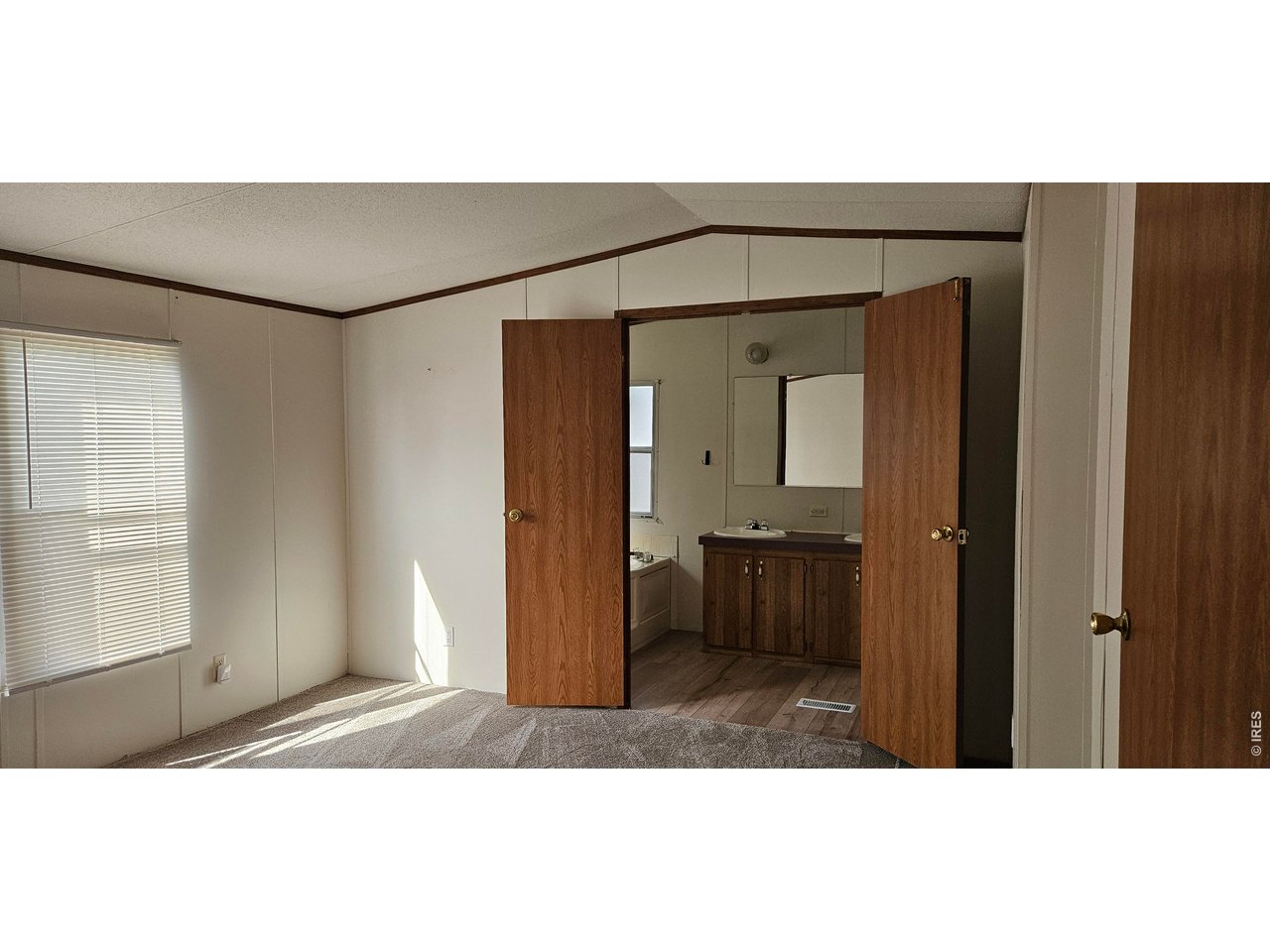 Property Photo 11 Primary Bedroom/Bath