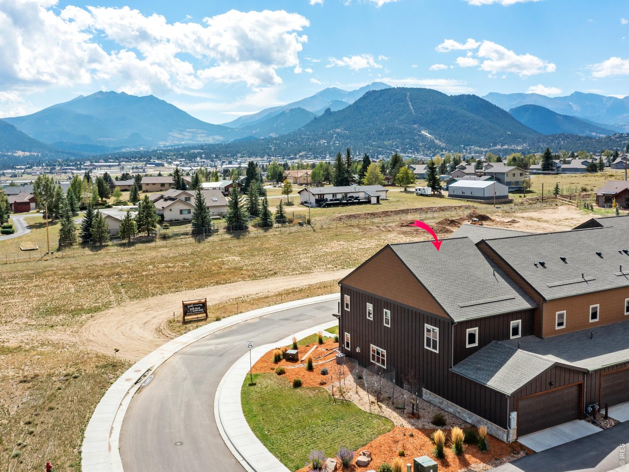 Property Photo 2 This beautifully appointed end unit townhome showcases exceptional quality, thoughtful design, and luxurious upgrades throughout, all framed by amazing mountain views.