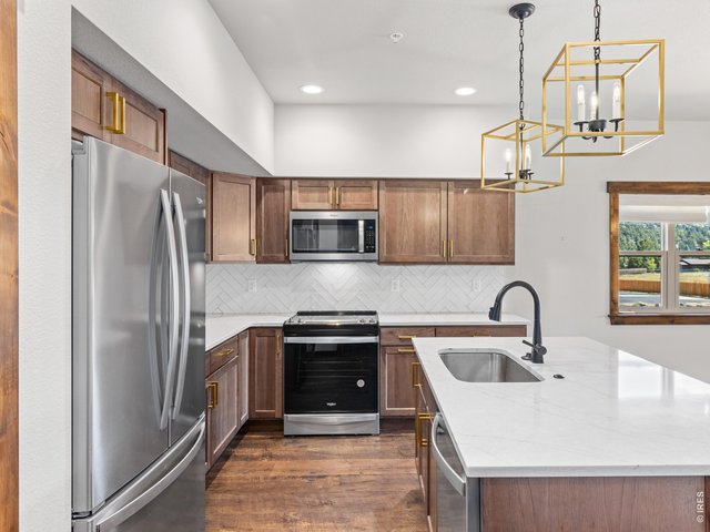 Property Photo 11 Kitchen features soft close cabinetry