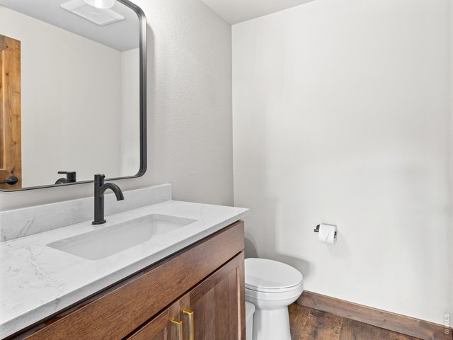 Property Photo 7 Powder room on the main level