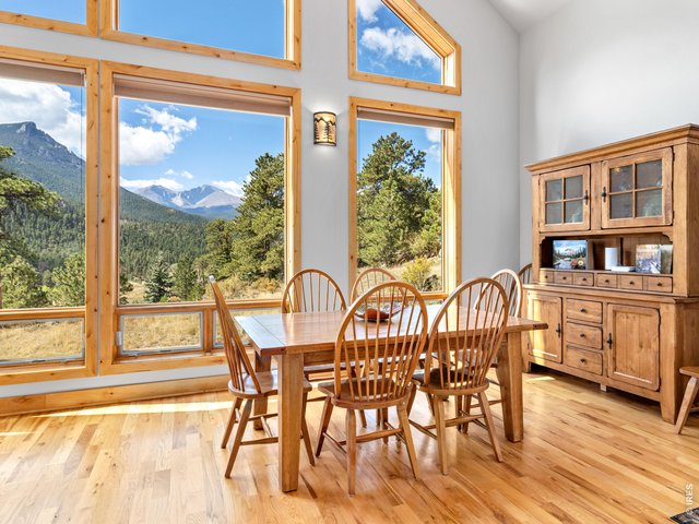 Property Photo 13 Dining with a huge view to snow-capped peaks