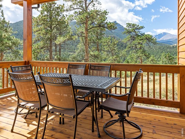 Property Photo 23 Covered, outdoor dining... or the ultimate home office:)