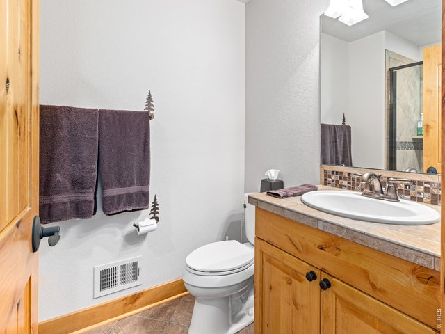 Property Photo 42 Bath 3 of 4