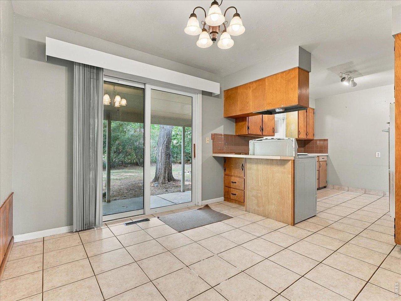Property Photo 6 dining area to kitchen view