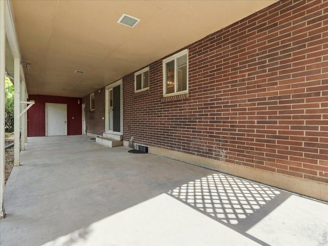 Property Photo 34 oversized covered patio... note the storage room at the end