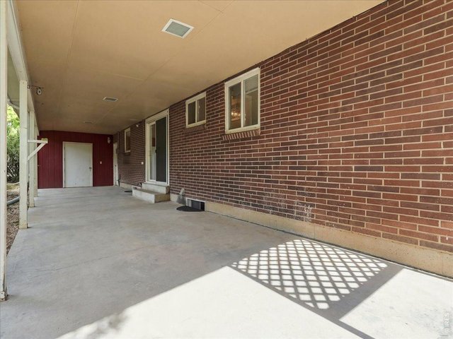 Property Photo 34 oversized covered patio... note the storage room at the end