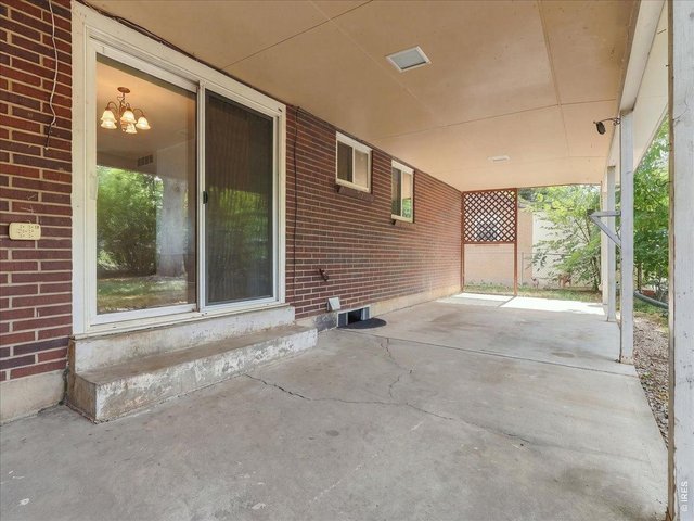 Property Photo 36 slider from patio to dining area