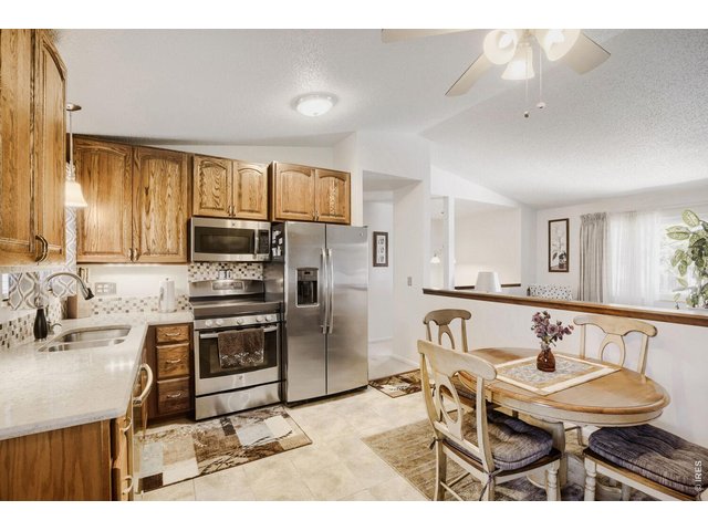 Property Photo 8 Renovated eat in Kitchen
