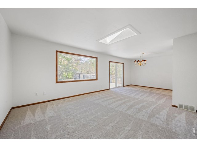 Property Photo 5 Main floor family room and dining room