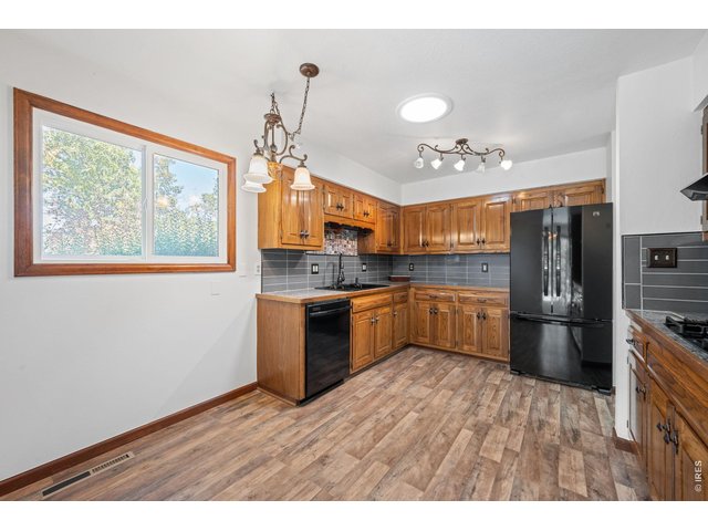 Property Photo 9 Eat-in kitchen with space for casual dining.