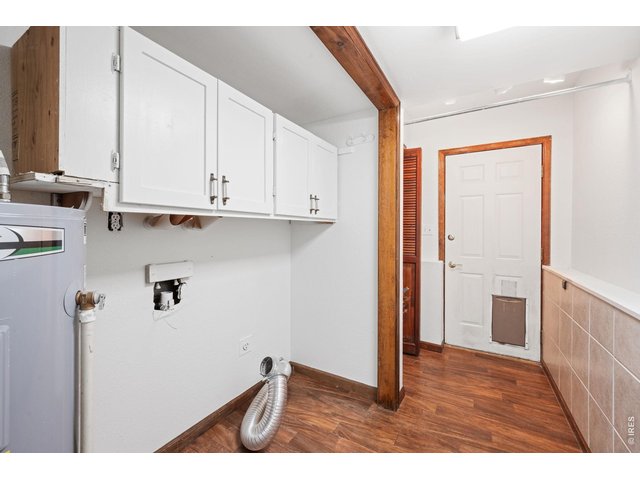Property Photo 15 Laundry room with convenient exterior access.