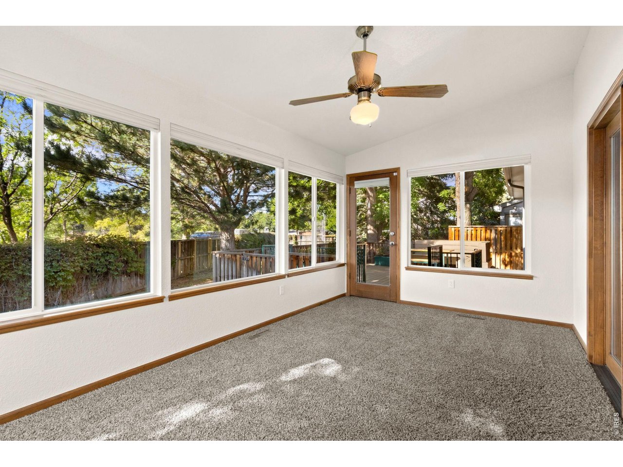 Property Photo 11 Enclosed sunroom