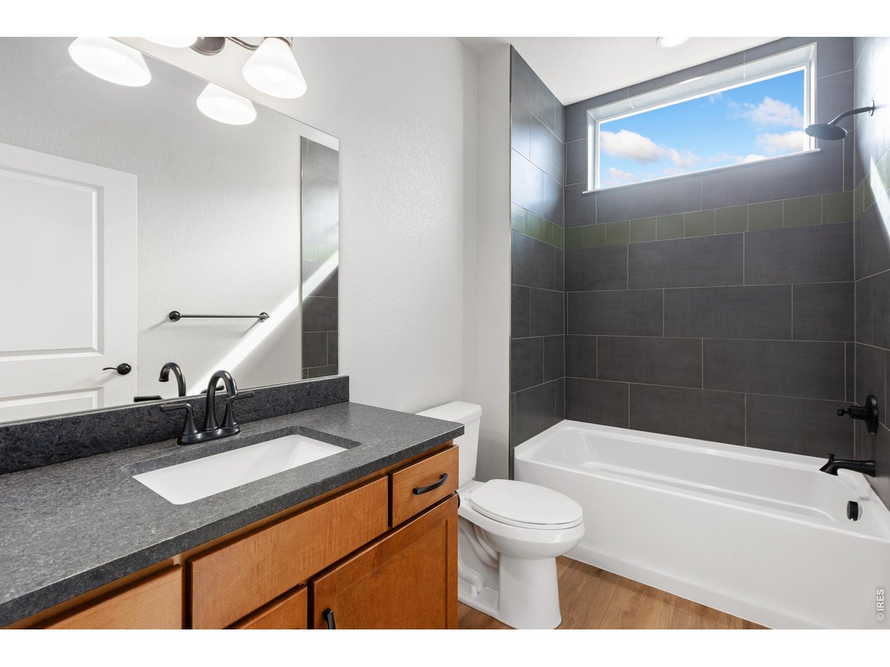 Property Photo 15 Shared bathroom. Finishes may vary.