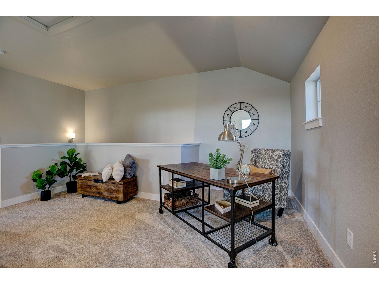 Property Photo 12 Upstairs loft area provides ample space for home workout room, home office, reading nook, and gaming area.