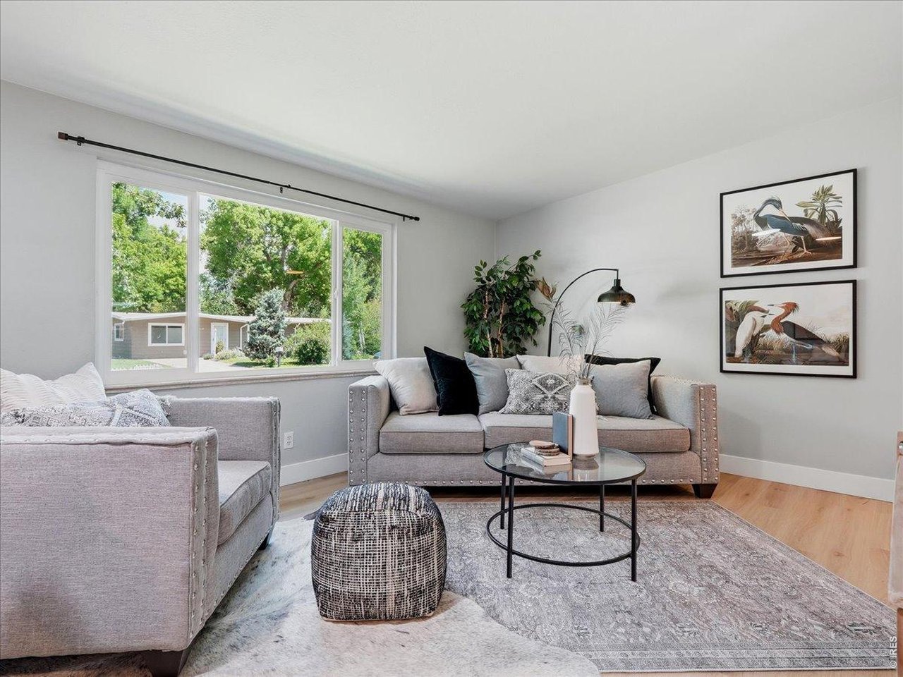 Property Photo 3 living room with large picture window,