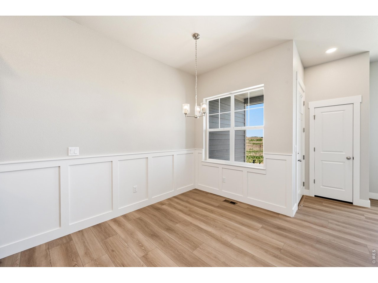 Property Photo 7 Upgraded wainscoting in the dining room included!
