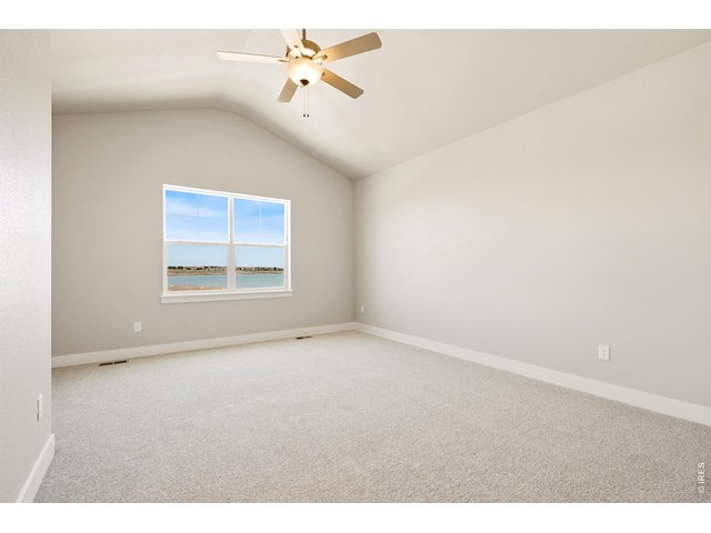 Property Photo 11 Primary bedroom with views of the lake - upstairs