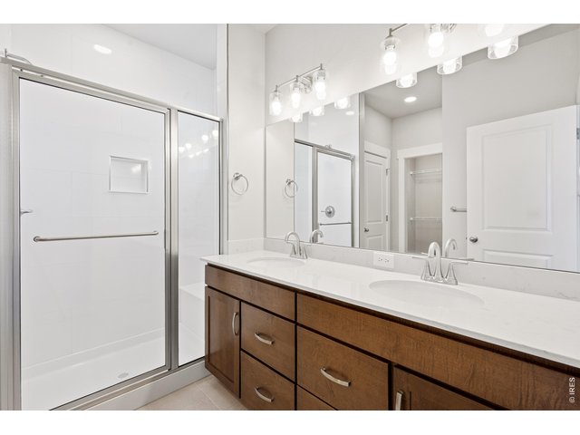 Property Photo 13 Primary bathroom with dual vanities
