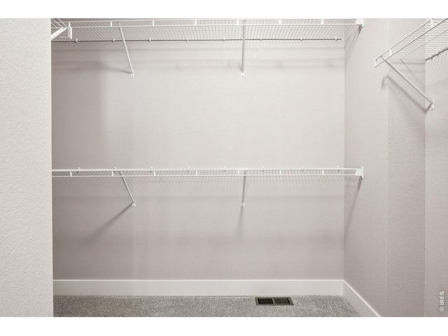 Property Photo 15 Primary walk-in closet