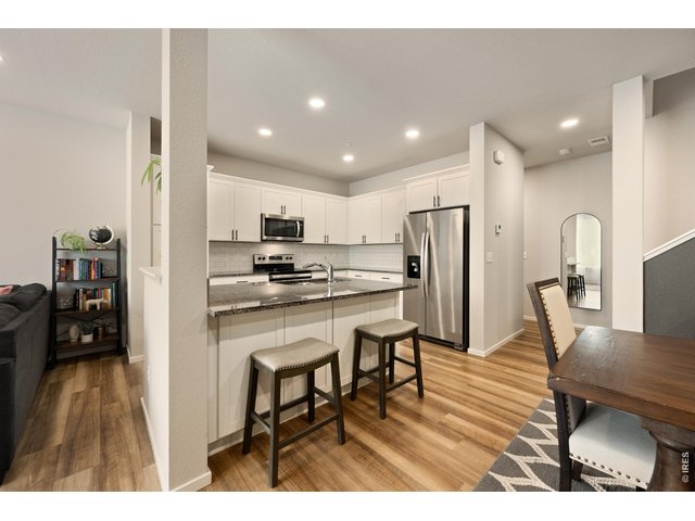 Property Photo 7 Modern Eat-In Kitchen with High End Finishes