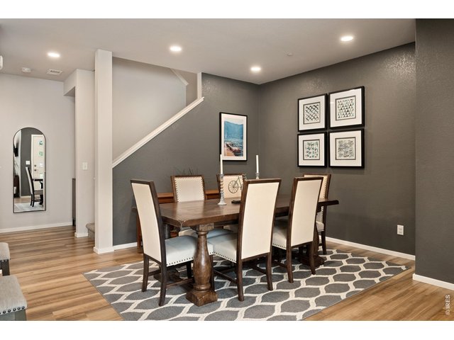 Property Photo 13 Dining Room with Accent Wall