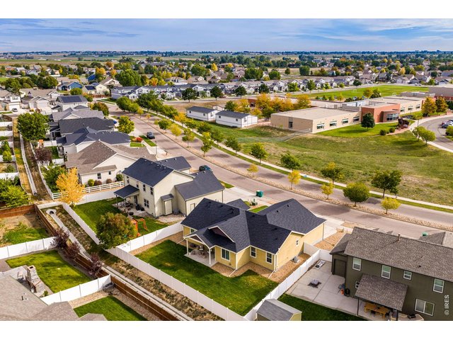 Property Photo 12 Great setting/location within Severance! backing to community greenspace, full vinyl fencing.