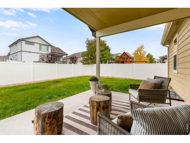 Property Photo 11 Adorable outdoor living! (Comes with the cute decorative wood stumps)