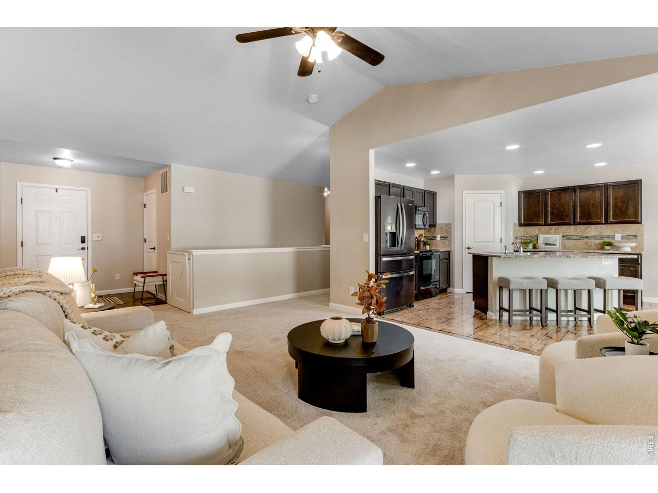 Property Photo 7 Open Concept living  - easy transition to the lower level - cavernous unfinished basement area with plumbing rough -in!