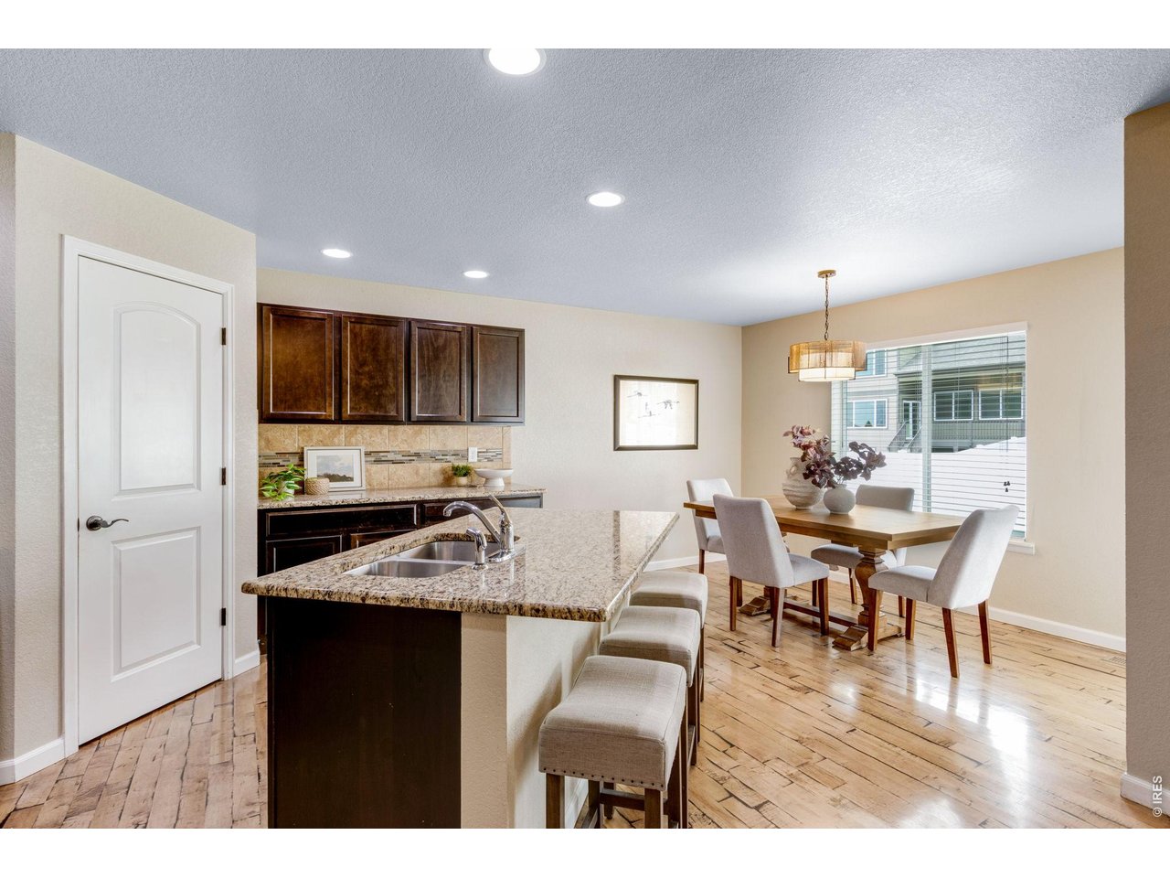 Property Photo 15 Shiny site finished hardwood floors, walk-in pantry, Slab Granite!
