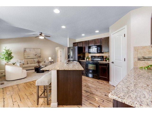 Property Photo 16 Ebonized HW flooring.