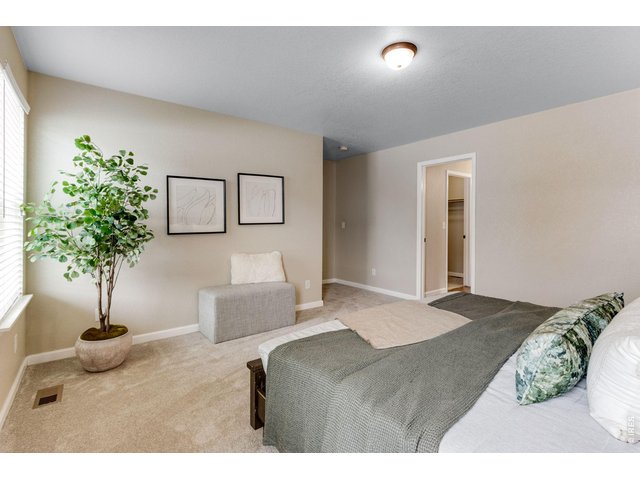 Property Photo 25 Another angle primary suite, features comfortable walk-in closet!