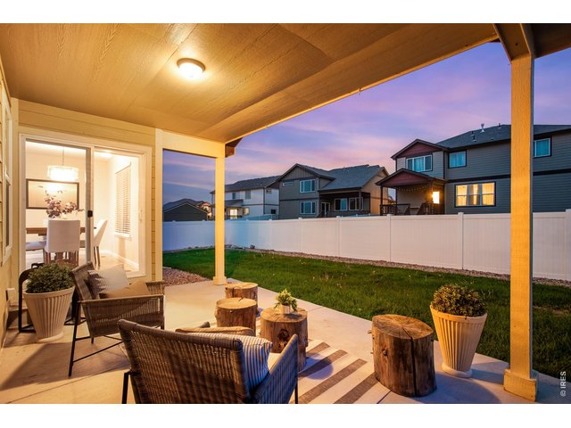Property Photo 4 Spacious Covered Patio area - nearly 200 SQFT. Convenient full privacy fencing - low maintenance vinyl.