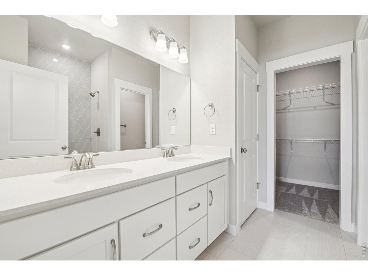 Property Photo 22 Primary bathroom with dual vanities