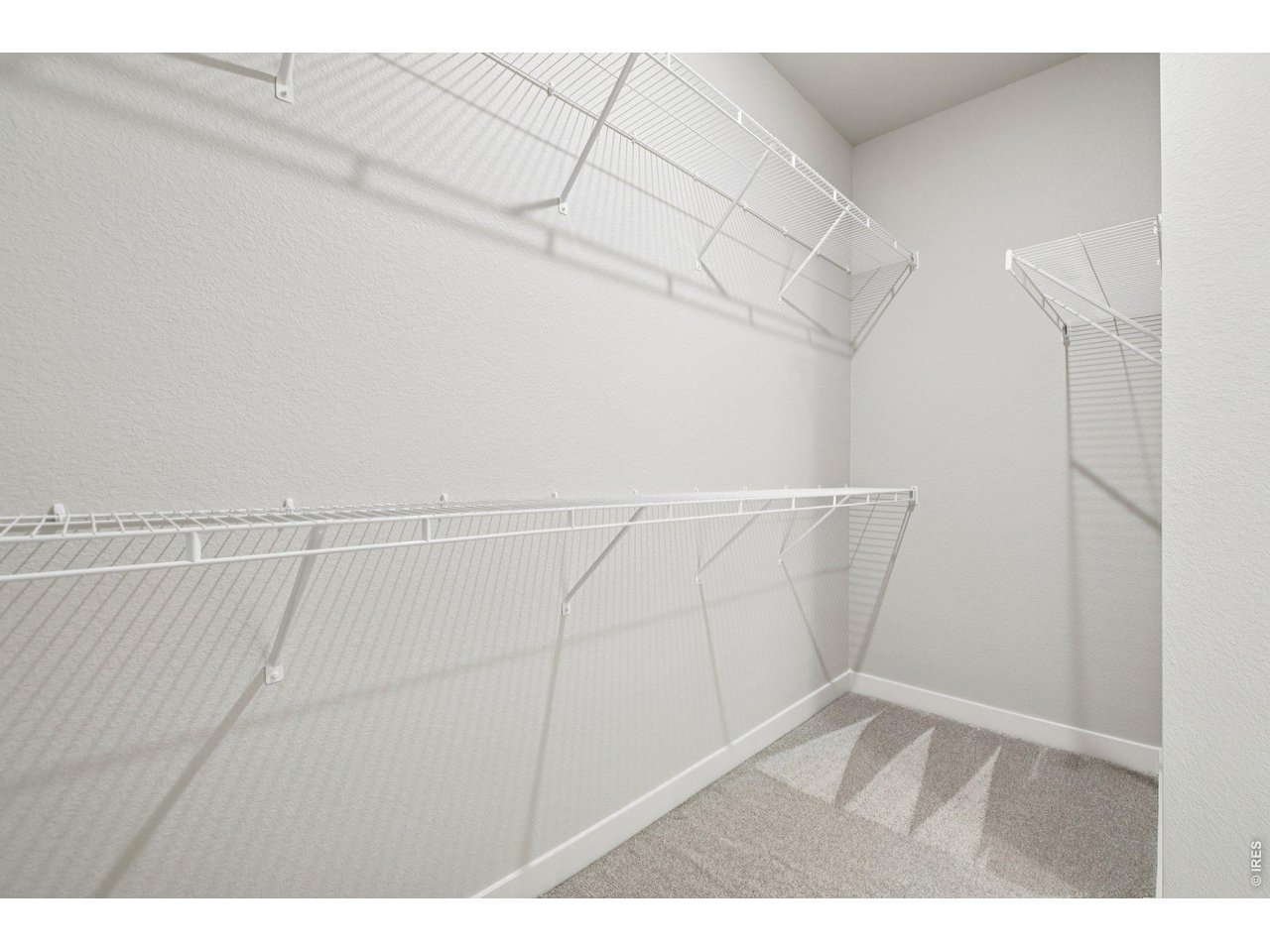 Property Photo 24 Primary walk-in closet