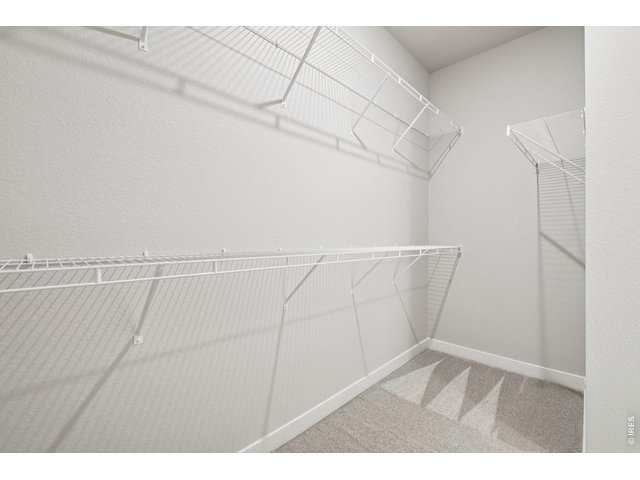 Property Photo 24 Primary walk-in closet