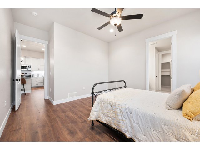 Property Photo 12 Prmiary bedroom with extended LVP.