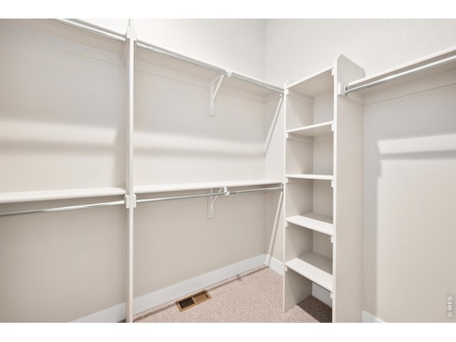 Property Photo 17 Primary walk-in closet
