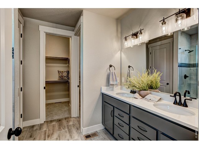 Property Photo 7 Primary bathroom. Finishes may vary.