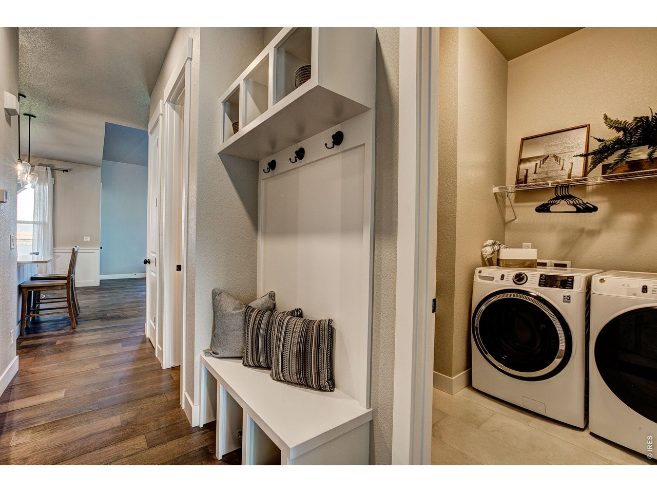Property Photo 9 Main floor laundry. Finishes may vary.
