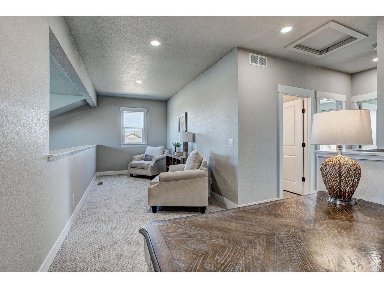Property Photo 11 Spacious upper loft area for home office, exercise room, gaming, reading and more!