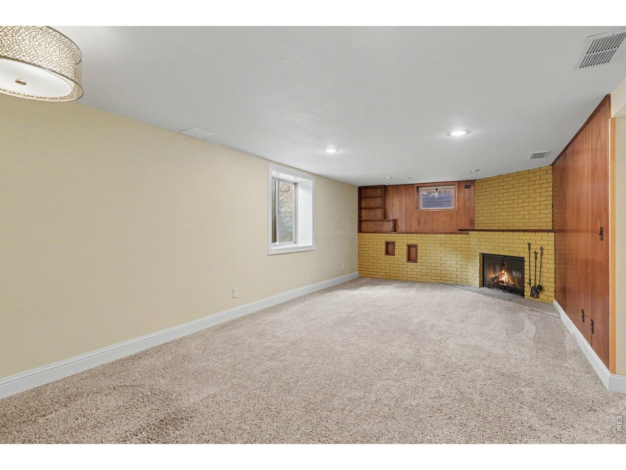 Property Photo 15 Large Family / Rec Room with Wood Burning Fireplace