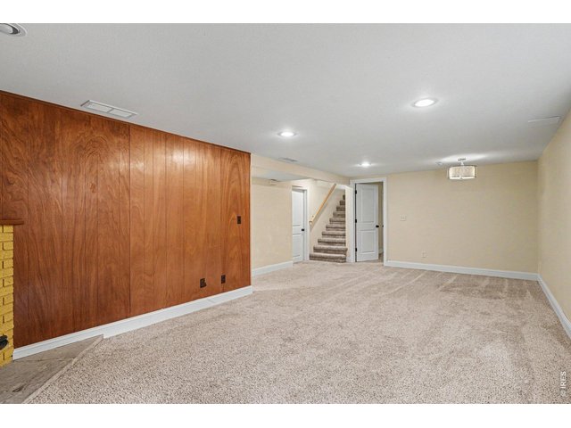 Property Photo 16 Plenty of space and plenty of light in Living / Rec Room.