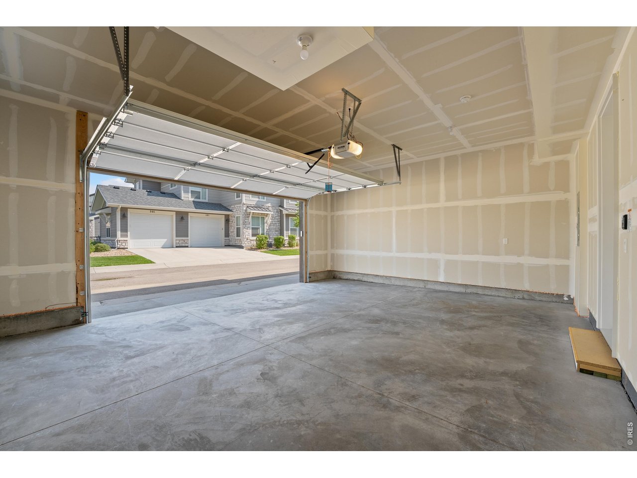 Property Photo 22 Oversized 2 car attached garage with plenty of room for storage!