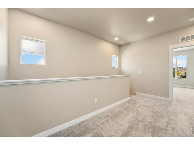 Property Photo 12 The loft space has room for a small home office or reading/gaming nook.