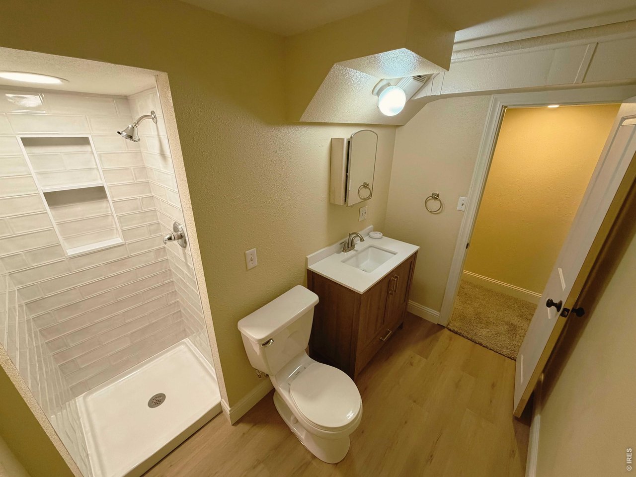 Property Photo 21 Updated Shower, Vanity, and Flooring!