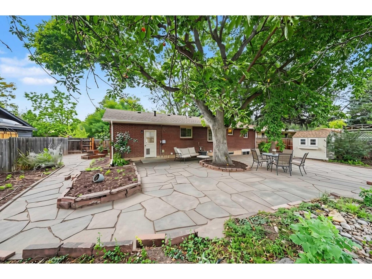 Property Photo 26 A Plethora of Patio Space (AI Enhanced Photo)