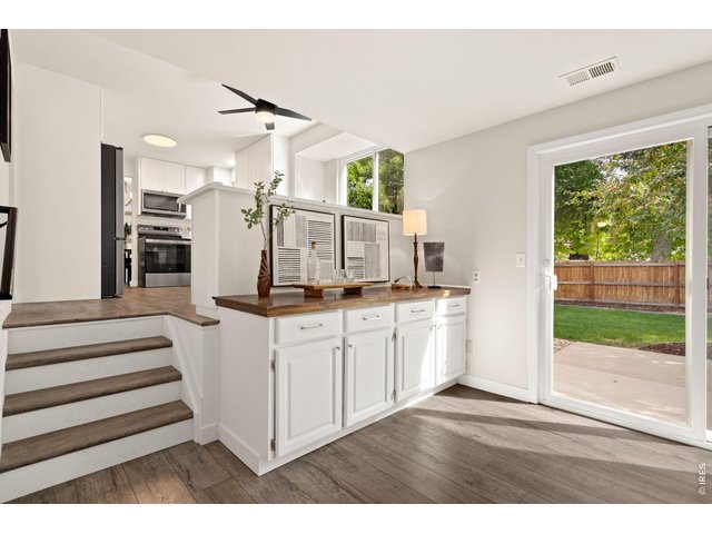 Property Photo 14 Luxury vinyl flows throughout the main and lower floors.