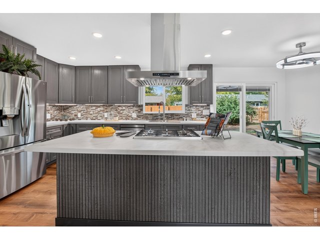 Property Photo 7 Gourmet kitchen with high-end appliances
